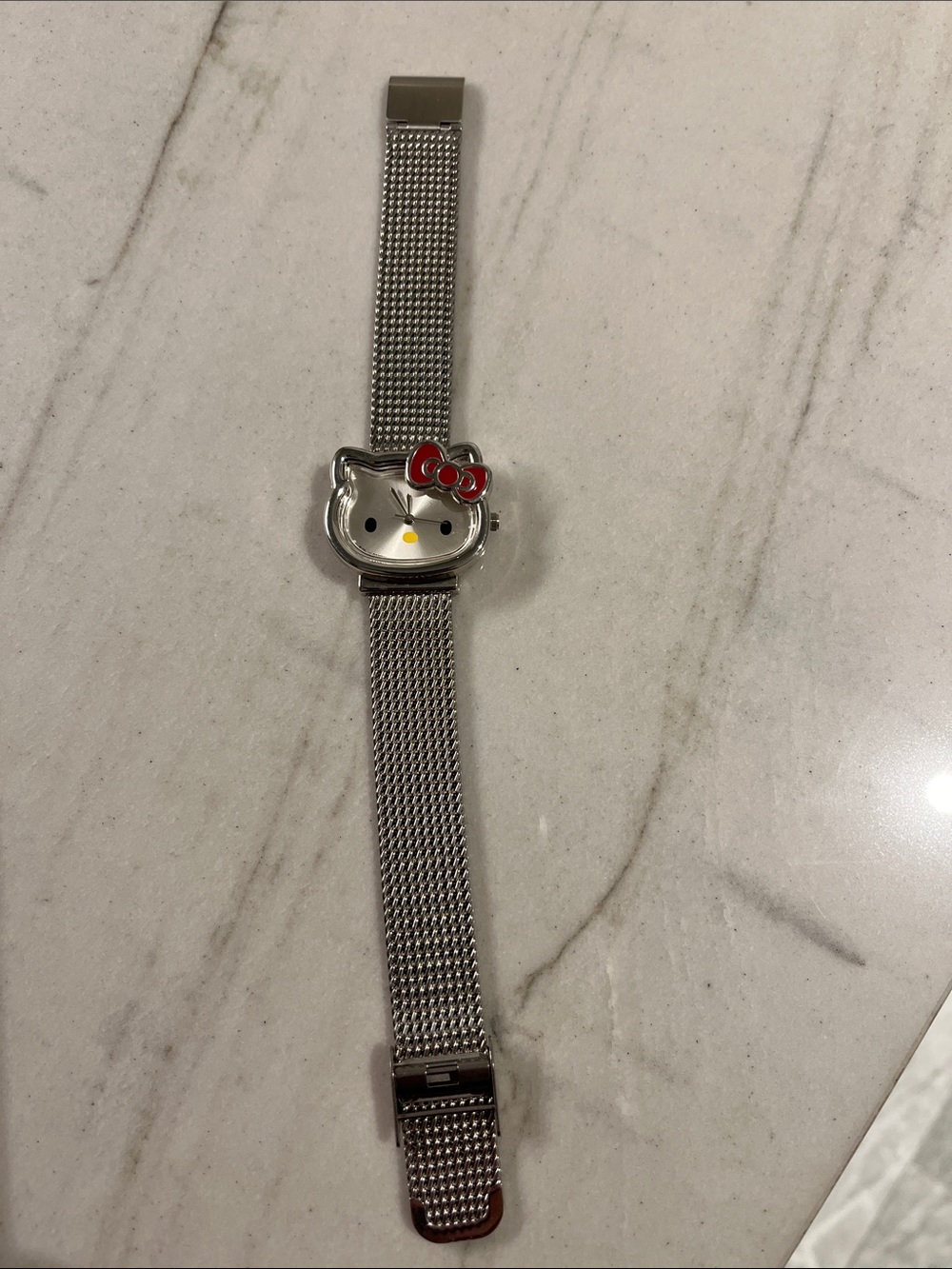 Hello Kitty Silver Mesh Bracelet Watch with Hot Pink Bow Accent
